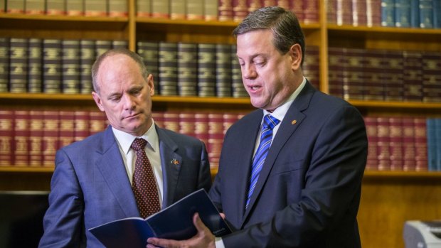 Tim Nicholls (right) has apologised for the performance of the LNP government led by Campbell Newman (left).