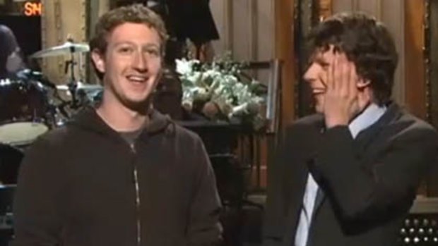 Founder of Facebook Mark Zuckerberg, left, with actor Jesse Eisenberg on Saturday Night Live.