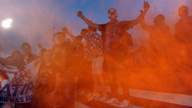 Canberra FC fans let off flares during the 2011 Canberra Premier League grand final.