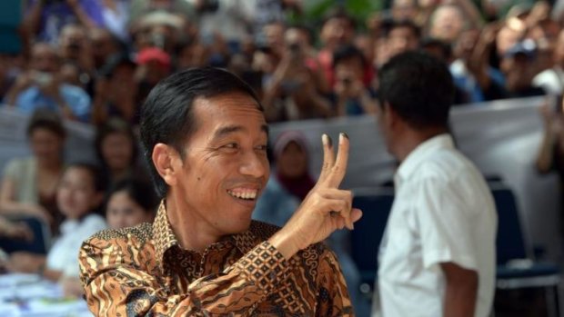 Indonesian presidential candidate Joko Widodo gestures after voting in Jakarta on Wednesday. 