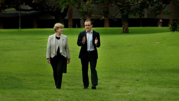 Greens leader Christine Milne and deputy leader Adam Bandt have been re-elected unopposed in a party room ballot.