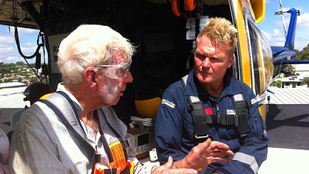 RACQ CareFlight Rescue Aircrewman, Richard Mitchell, pictured with rescued man, Colin Clift.