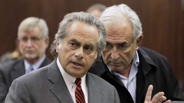 Top adversary ... Dominique Strauss-Kahn, right, during his arraignment with his chief lawyer, Ben Brafman.