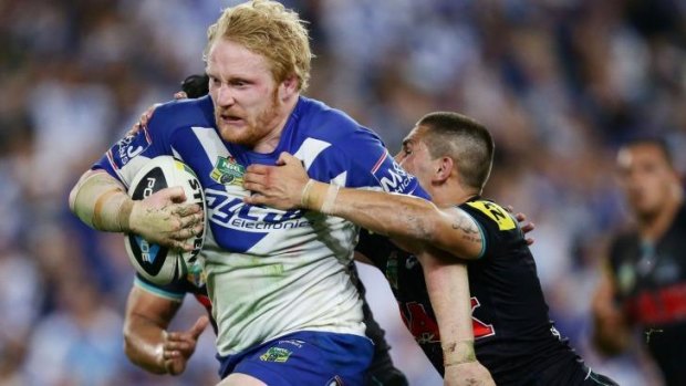 Man of steel: James Graham takes on the Penrith defence in Saturday's preliminary final.