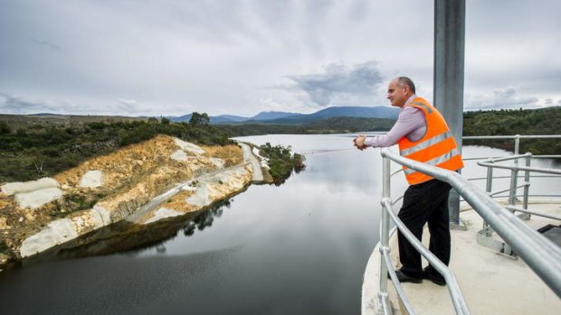 Actew's Chris Webb looks out from the Cotter Dam wall. The water is currently at 47%.