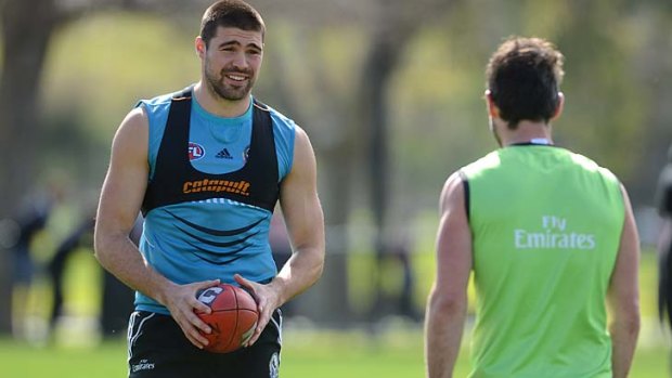 Sidelined: Chris Dawes, who faces some tough work to force his way back into the Collingwood line-up, trains yesterday.