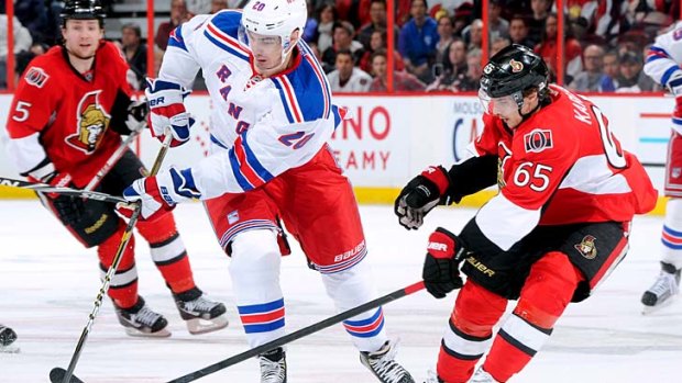Chill out ... the Ottawa Senators (in red) take on the New York Rangers.