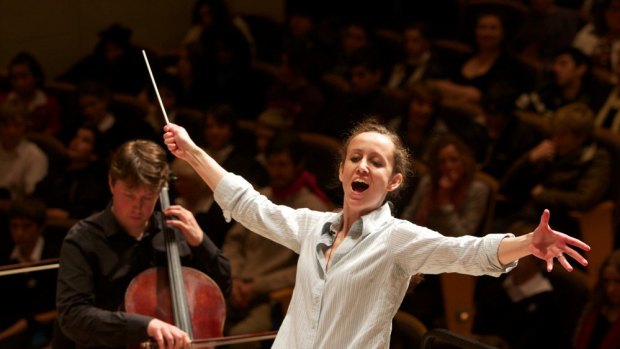 Jessica Cottis, assistant conductor at the Sydney Symphony Orchestra, conducts a concert in 2012. 