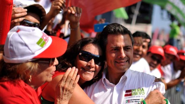 "Hug path" ... Enrique Pena Nieto, 45, looks set to be Mexico's new president.