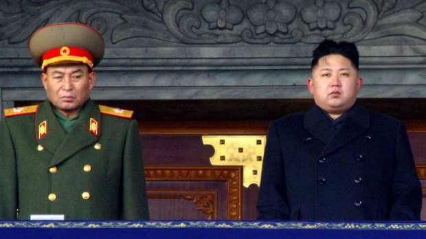 This file picture shows Ri Yong-Ho, left, with Kim Jong-Un, right, attending the mourning service for late North Korea leader Kim Jong-Il in Pyongyang.