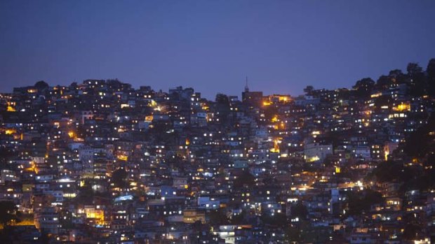 Silent night ... the Rocinha favela was invaded in a pre-dawn raid as part of operations to make the city secure against drug gangs before the 2014 World Cup and 2016 Olympics.