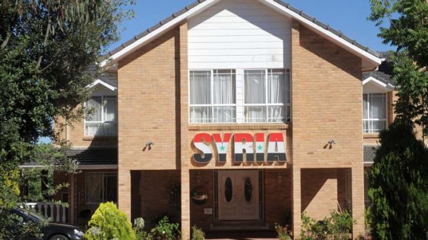 Intruders ... 30 people stormed the Syrian embassy in Canberra on Saturday night.