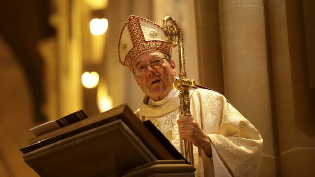 Cardinal George Pell gives mass at St Mary's Cathedral on Thursday.