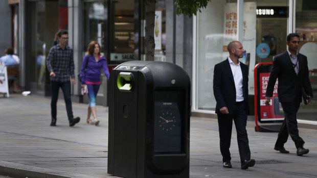 Officials say that an advertising firm must immediately stop using its network of high-tech rubbish bins, like this one, to track people walking through London's financial district.