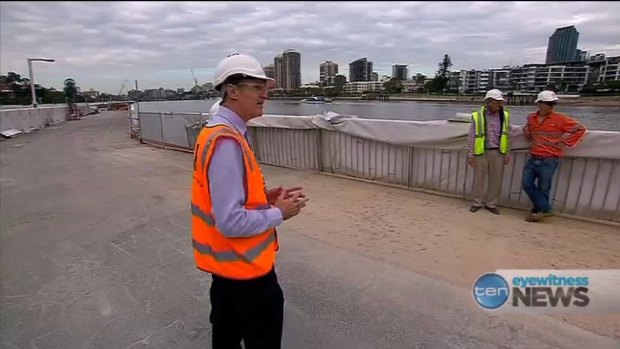 Lord Mayor Graham Quirk inspects work on Riverwalk.