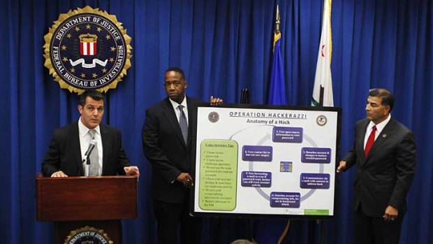 FBI Cyber Supervisor Agent Cameron Malin, left,  speaks about the anatomy of a computer hack.