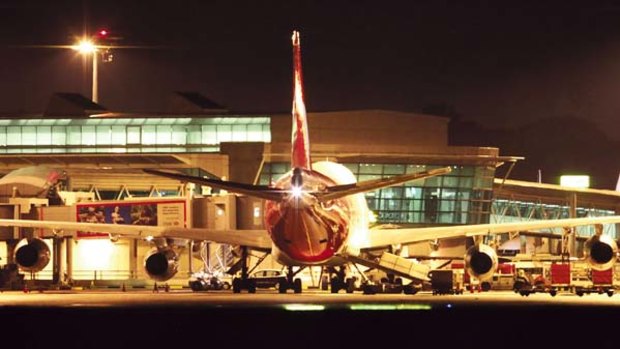 Safety concerns... the Qantas 747-400 at Changi Airport after the emergency landing.