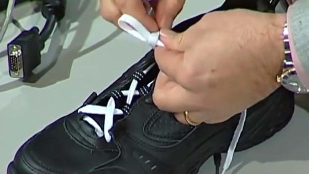 The bleeding obvious: Terry Moore ties a shoelace the better way.
