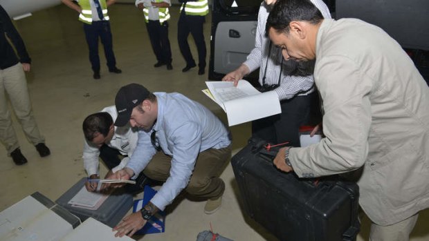 Samples brought back by the UN chemical weapons inspection team are checked in upon their arrival at The Hague, Netherlands. Syria has sent the Organisation for the Prohibition of Chemical Weapons an "initial declaration" outlining its weapons program, the organisation.