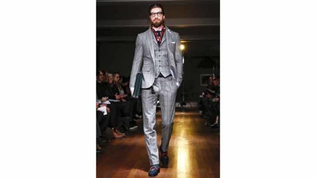 Three-piece suits will add elegance, like this one from the Michael Bastian display in New York.