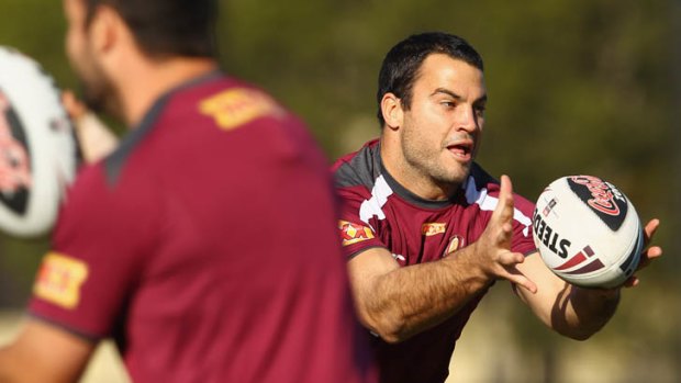 Soldiering on ... David Shillington on the run during a Queensland Maroons training session at Xavier College.