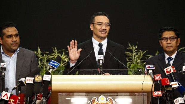 Malaysia's acting transport minister Hishammuddin Hussein giving an explanation in March last year.