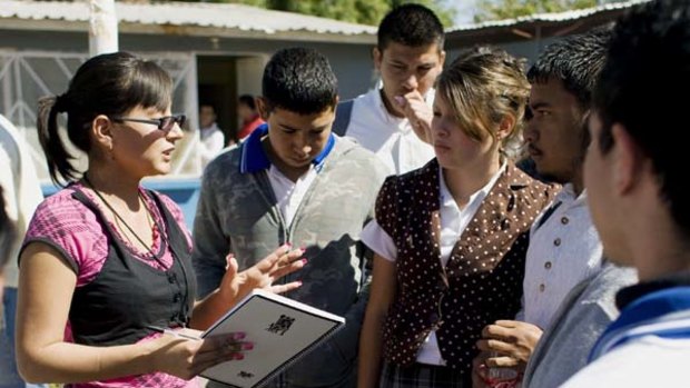 Marisol Valles speaks with high school students.