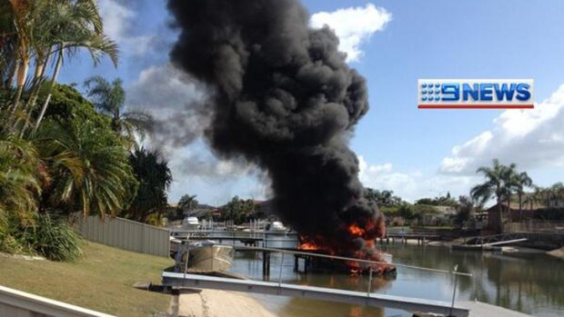 Plumes of smoke billowed from the boat which exploded in a Paradise Point canal. Photo: Nine News.