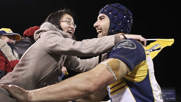 Scott Fardy of the Brumbies is congratulated by a fan after they beat the British & Irish Lions.