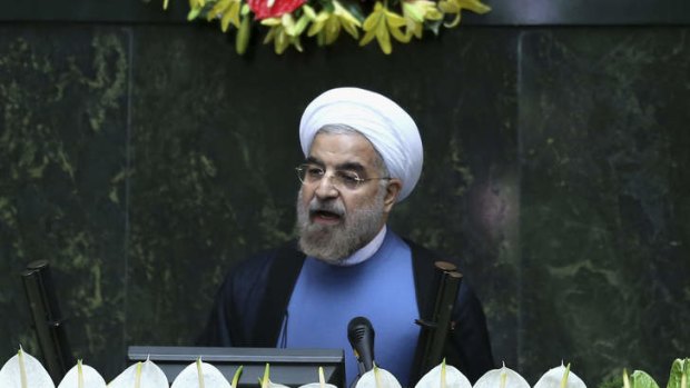 Iran's new President Hasan Rouhani delivers a speech after his swearing-in at the parliament in Tehran.