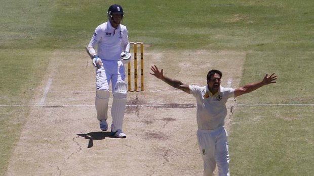 Mitchell Johnson successfully appeals for the wicket of Stuart Broad.