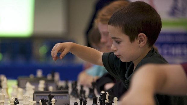 Seven-year-old Yoni Chul is the youngest entrant in the two-day Chess Kids tournament at Monash University's Clayton campus.