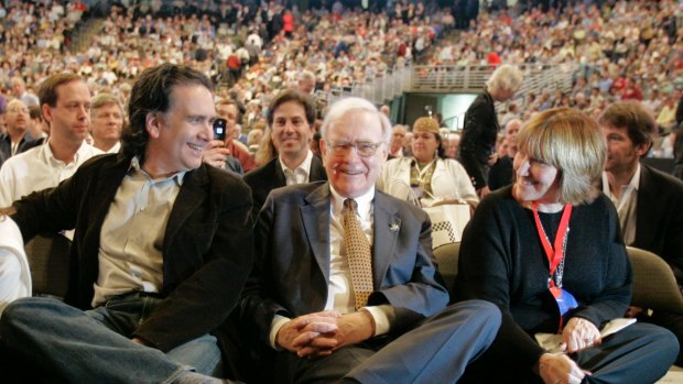 Billionaire investor Warren Buffett with his children Peter and Susie.