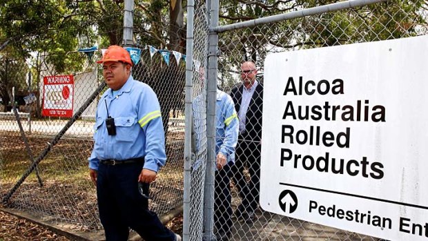 Exit: Workers at Alcoa Australia in Yennora, which has announced it is soon to end operations.