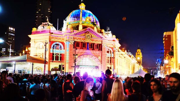 Celebration: The crowd around Flinders Street Station during last year's White Night.