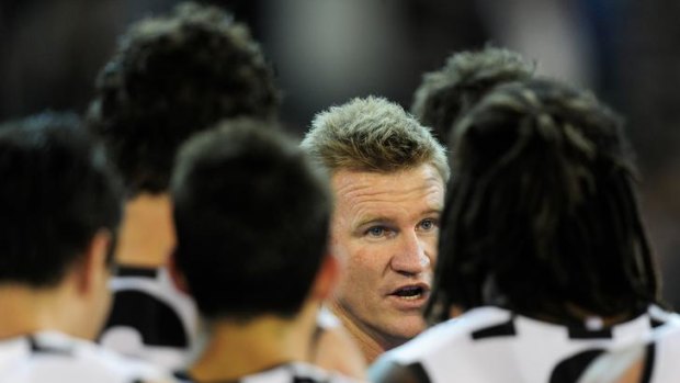 Collingwood coach Nathan Buckley addressing his charges against the Blues on Friday night.
