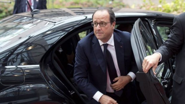 French president Francois Hollande arrives on August 30 2014 for a European Union summit at EU headquarters in Brussels.