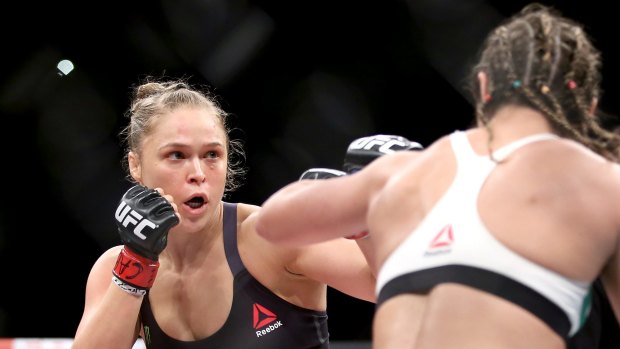 Keep it together: Ronda Rousey pummels Bethe Correia.