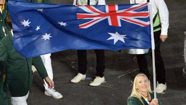 Australia's flagbearer Lauren Jackson.