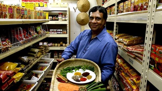 Aromatic ... Sunil Ranasinghe displays the ingredients for his red lentil curry mix available at his Thornleigh store.