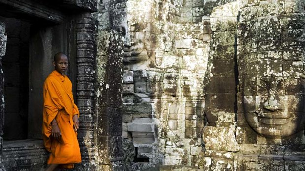World of colour ... a monk at Angkor Thom.