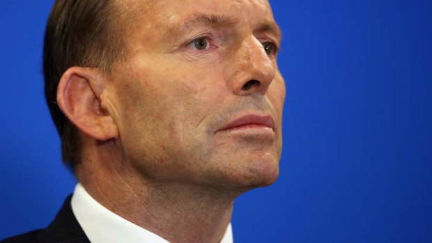 Prime Minister Tony Abbott in London for intelligence briefings. His visit has been slammed by MP Clive Palmer as the budget deadlock continues.