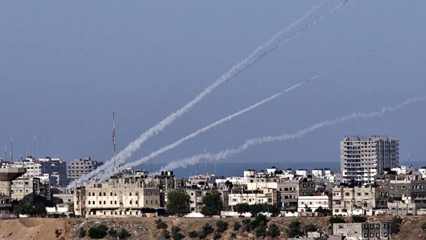 Air strike ... four rockets are launched from the Gaza Strip into Israel.