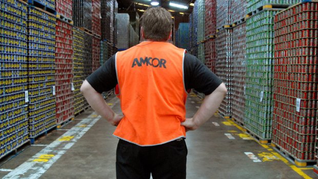 Hard times: Amcor ups its profits but cuts back its workforce.
