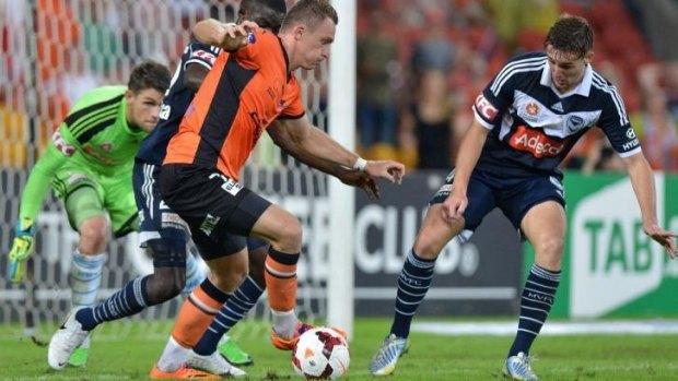 Besart Berisha looks to take on the Melbourne Victory defence.