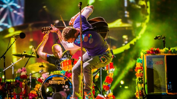 Will Champion from band Coldplay during rehearsals for a special