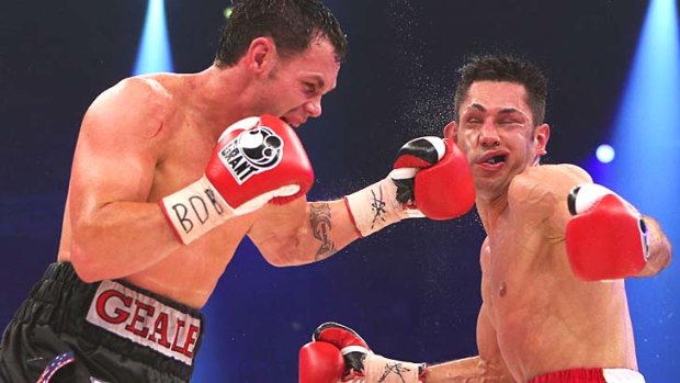 Australian Daniel Geale connects with a punch to the head of Felix Sturm of Germany during their WBA and IBF middleweight world championship fight.