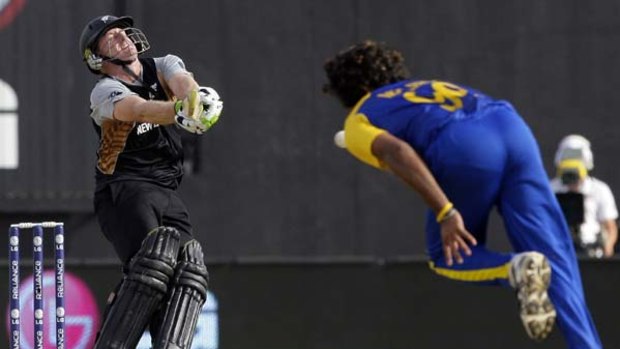 Scott Styris plays pulls a shot off Sri Lanka's Lasith Malinga's bowling.