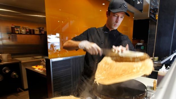 Flair ... Florian Guillemard works his magic behind the crepe pans.