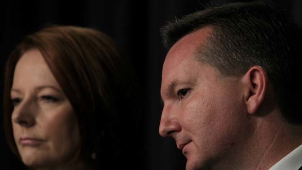Immigration Minister Chris Bowen is in a bind over how children will be treated under the Malaysian solution'.